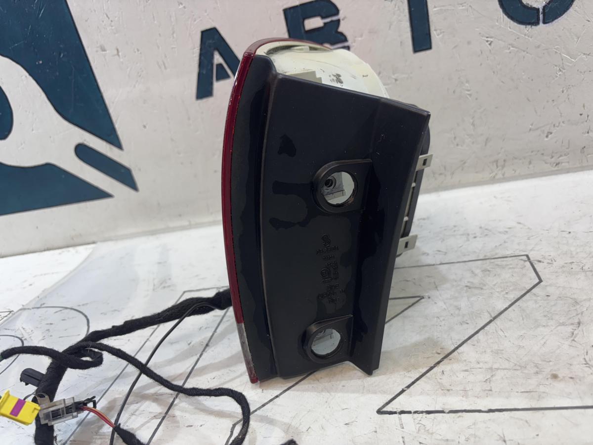 Фонарь левый 7L6945095K Volkswagen Touareg I