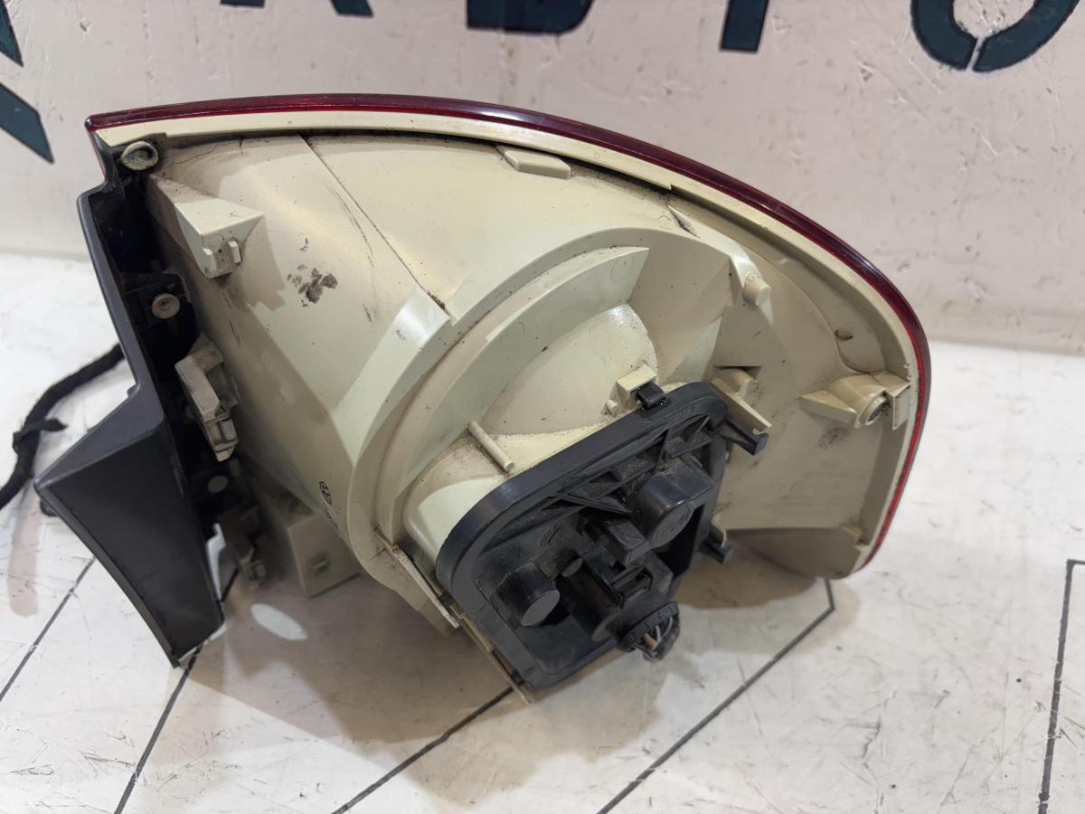 Фонарь левый 7L6945095K Volkswagen Touareg I