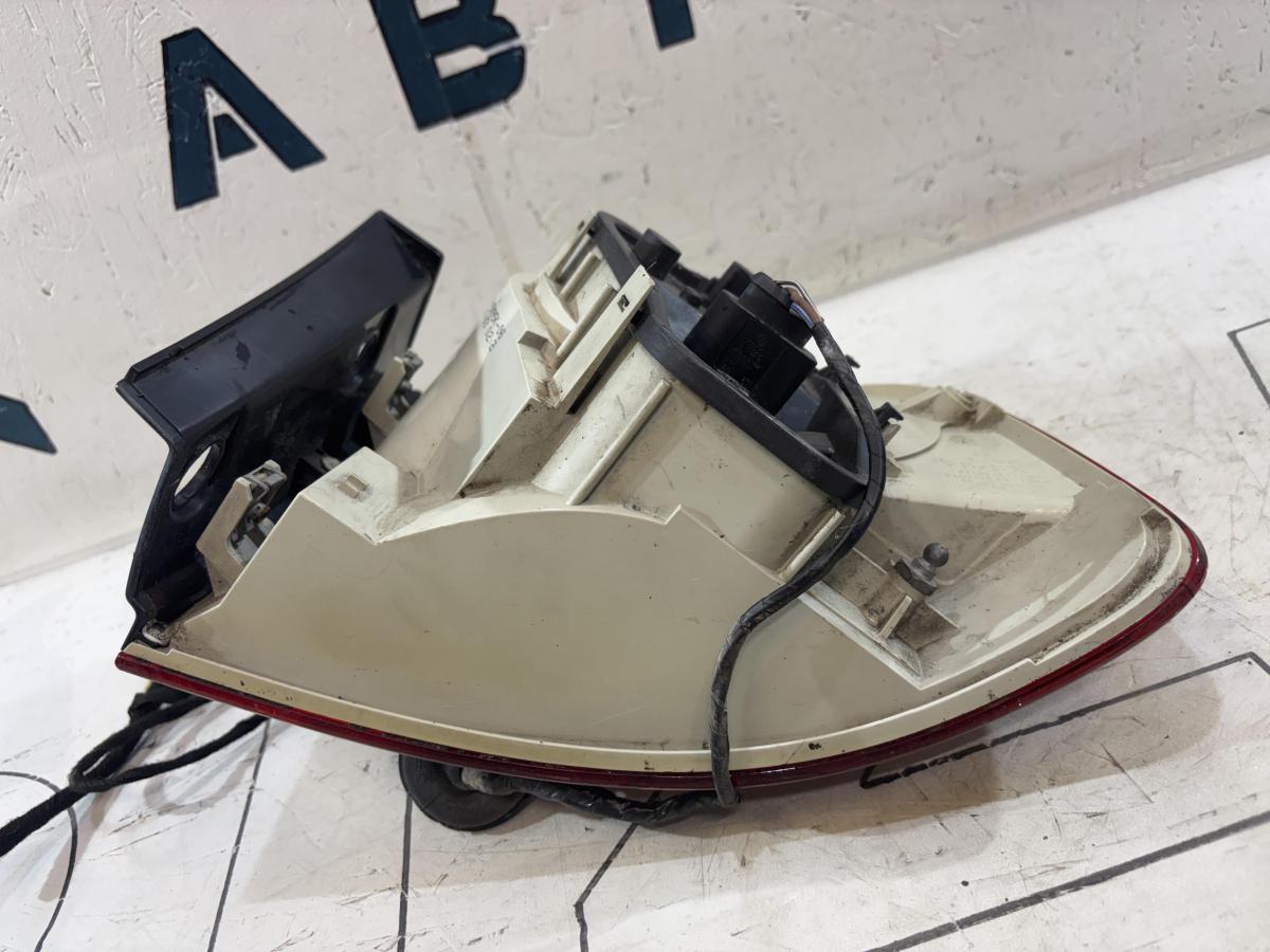 Фонарь левый 7L6945095K Volkswagen Touareg I