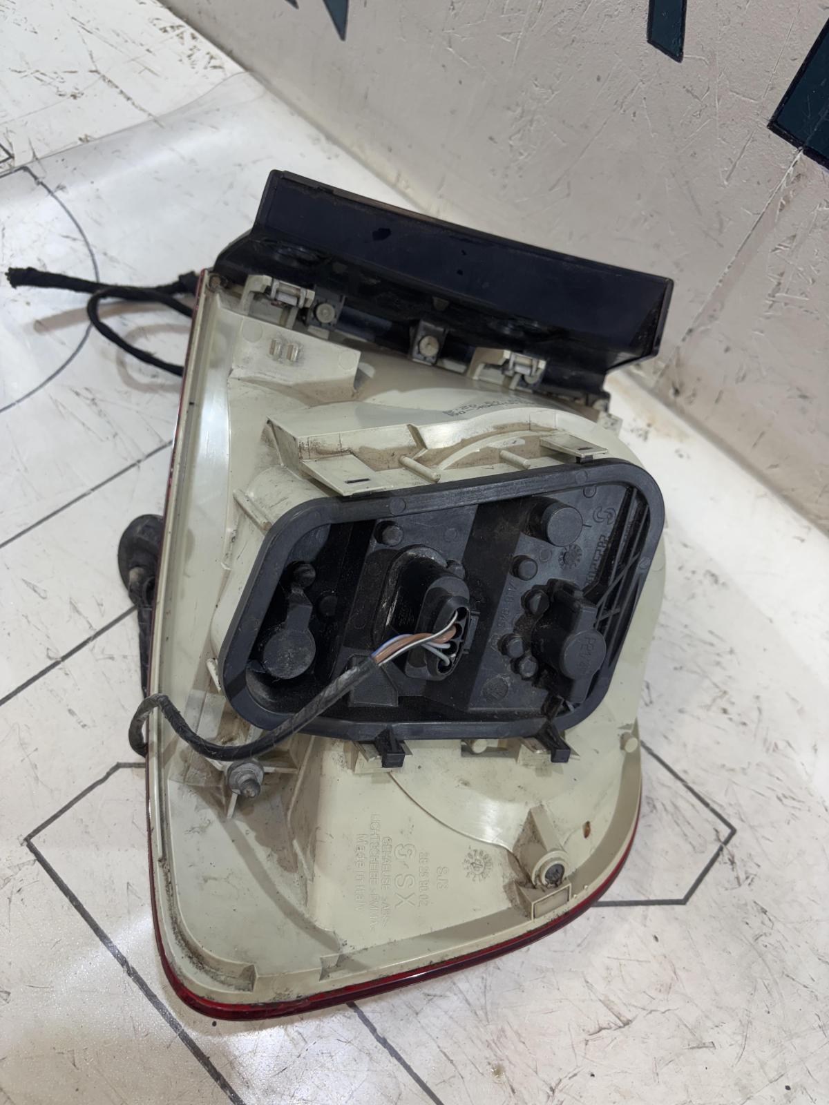 Фонарь левый 7L6945095K Volkswagen Touareg I