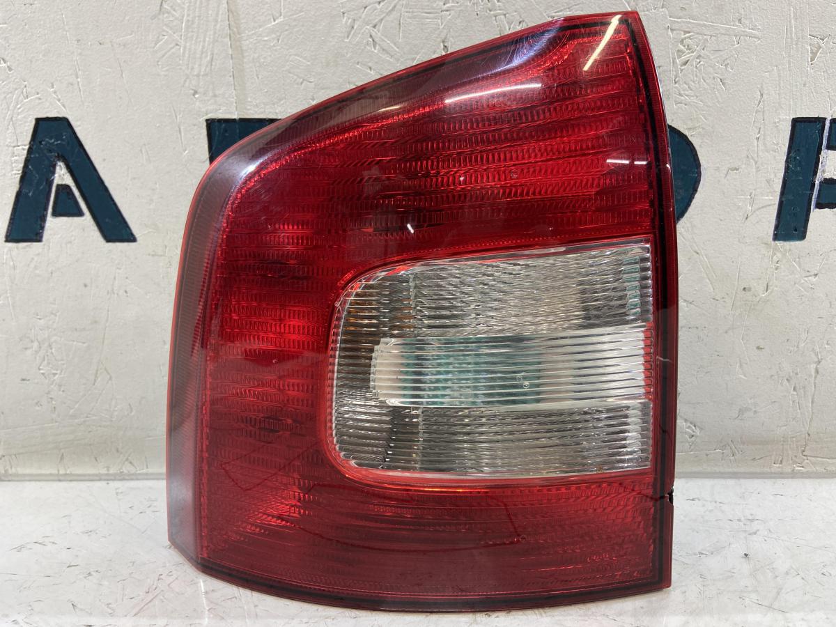 Фонарь задний левый 1Z9945095A Skoda Octavia II рест