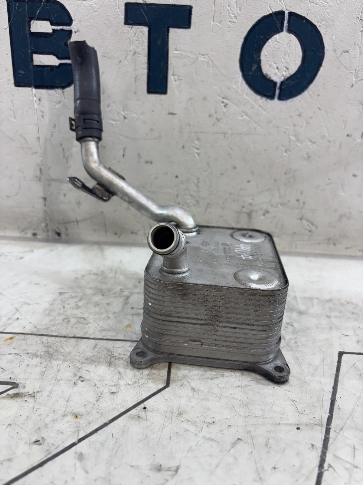 Масляный радиатор 079117021M 